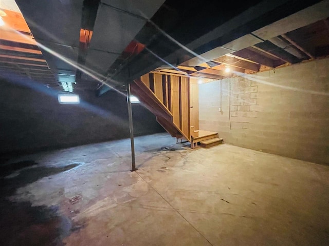204 E Forest Home Ave, Bellaire, MI 49615 - below grade area featuring stairway
