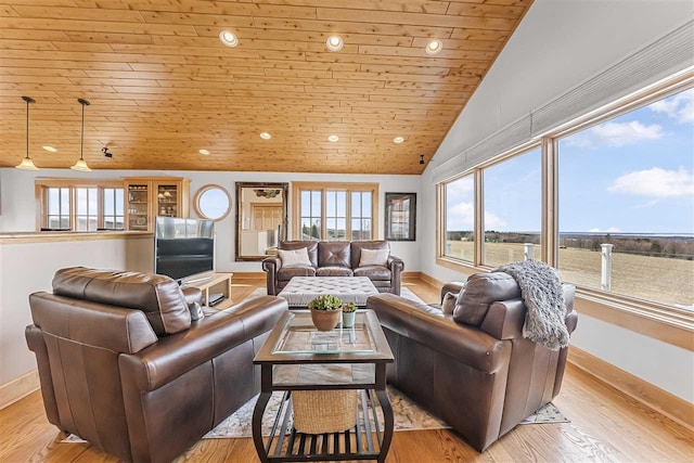 4133 Shadynook Rd, Central Lake, MI 49622 - living area with baseboards, vaulted ceiling, wood ceiling, recessed lighting, and wood finished floors