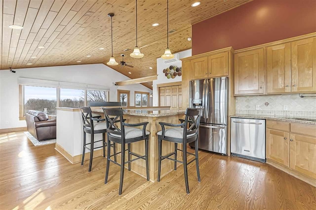 4133 Shadynook Rd, Central Lake, MI 49622 - kitchen featuring stainless steel appliances, wooden ceiling, light wood-style floors, light stone countertops, and plenty of natural light