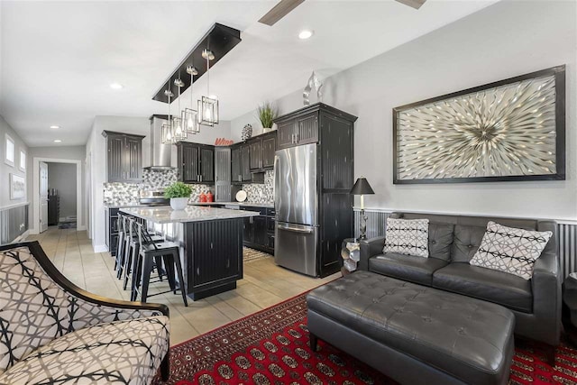 4133 Shadynook Rd, Central Lake, MI 49622 - living room with light tile patterned floors and recessed lighting