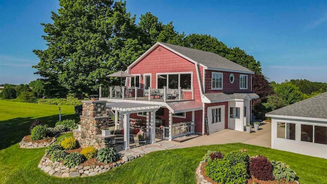 4133 Shadynook Rd, Central Lake, MI 49622 - back of house featuring a yard and a patio area