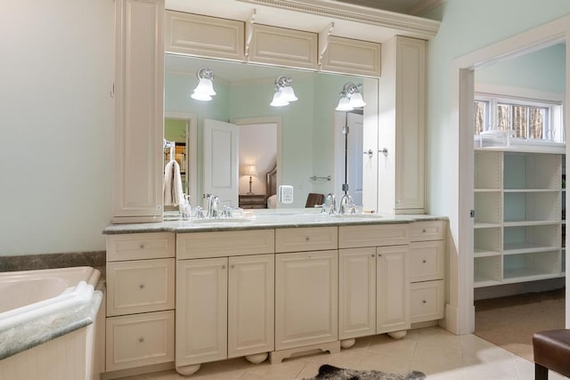 334 Birchwood Ter, Harbor Springs, MI 49740 - bathroom featuring double vanity, tile patterned floors, and connected bathroom