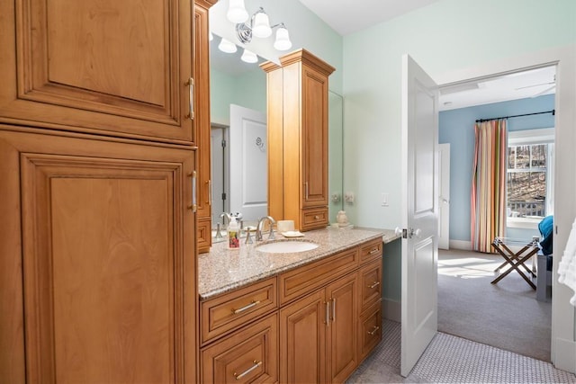 334 Birchwood Ter, Harbor Springs, MI 49740 - bathroom featuring baseboards and vanity