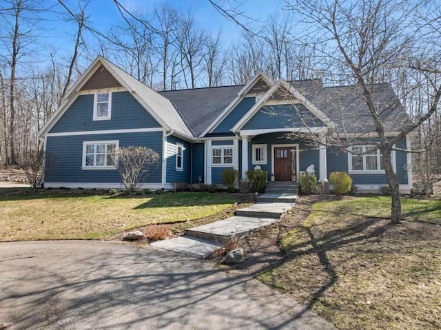 334 Birchwood Ter, Harbor Springs, MI 49740 - view of front of home featuring a front lawn