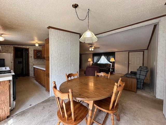 4049 Musser Rd, Mancelona, MI 49659 - dining area with a textured ceiling, light colored carpet, a ceiling fan, and wallpapered walls