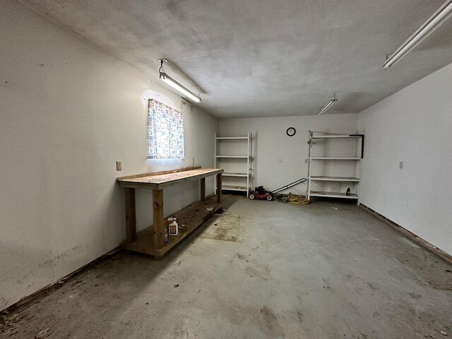 4049 Musser Rd, Mancelona, MI 49659 - basement with a workshop area