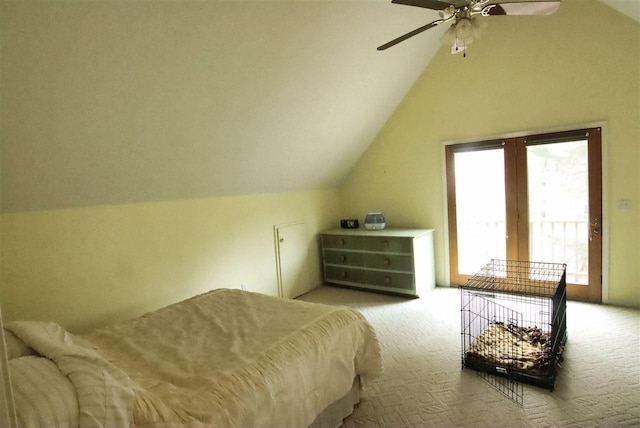 3330 Commodore Dr, East Jordan, MI 49727 - carpeted bedroom featuring vaulted ceiling, access to outside, and a ceiling fan