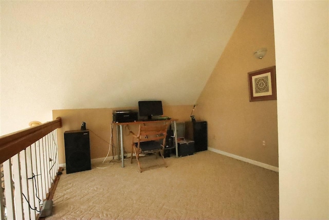 3330 Commodore Dr, East Jordan, MI 49727 - carpeted home office with lofted ceiling and baseboards