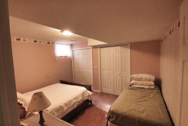 3330 Commodore Dr, East Jordan, MI 49727 - bedroom featuring two closets and carpet floors