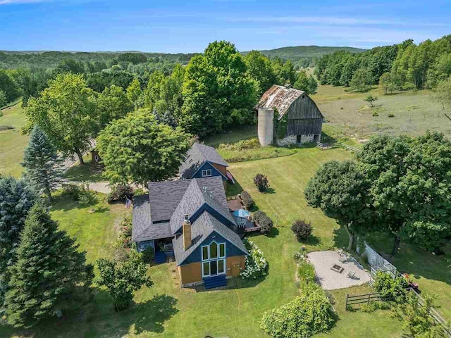 101 S Addis Rd, Boyne City, MI 49712 - aerial view of property and surrounding area featuring a heavily wooded area
