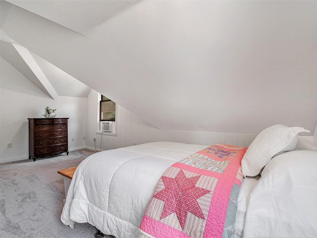 101 S Addis Rd, Boyne City, MI 49712 - bedroom with vaulted ceiling, carpet, baseboards, and cooling unit