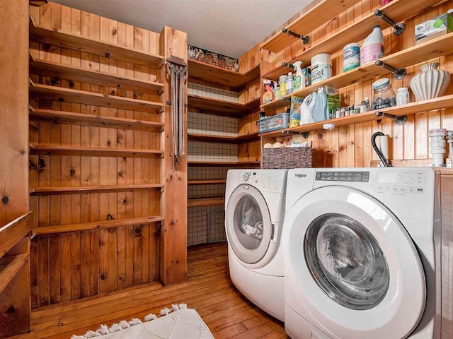 101 S Addis Rd, Boyne City, MI 49712 - laundry area with washing machine and dryer and hardwood / wood-style flooring