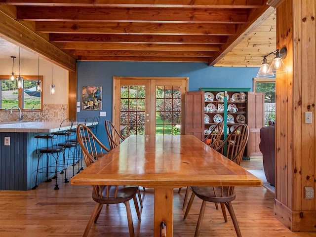 101 S Addis Rd, Boyne City, MI 49712 - dining room with beam ceiling and wood finished floors