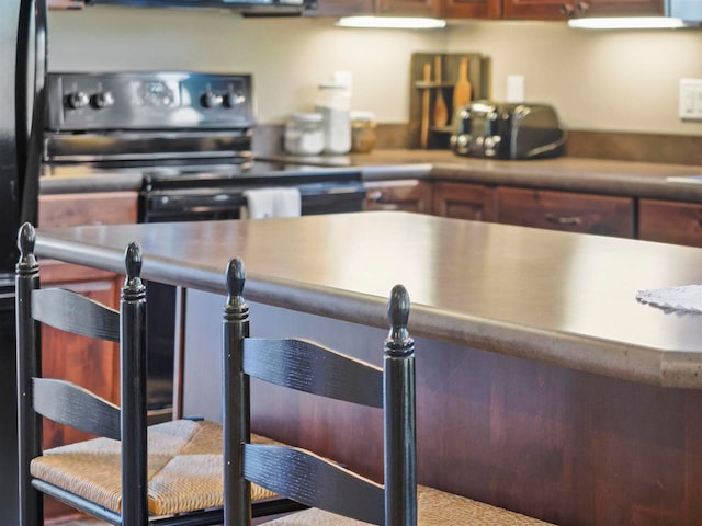 10300 Vista Ridge Dr, Alden, MI 49612 - kitchen featuring stainless steel electric stove