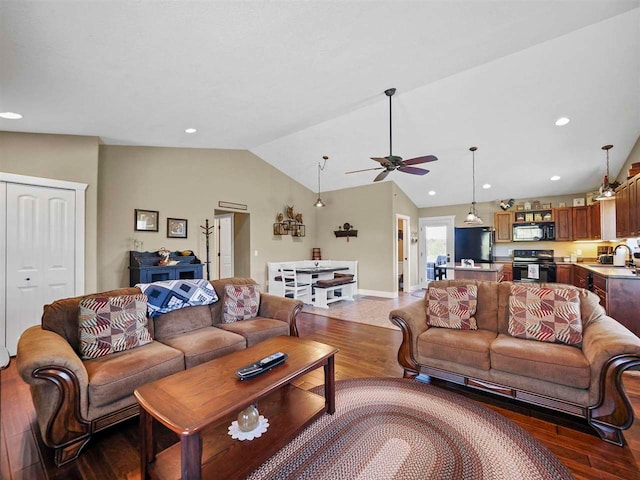 10300 Vista Ridge Dr, Alden, MI 49612 - living area featuring ceiling fan, light wood-style floors, lofted ceiling, recessed lighting, and baseboards