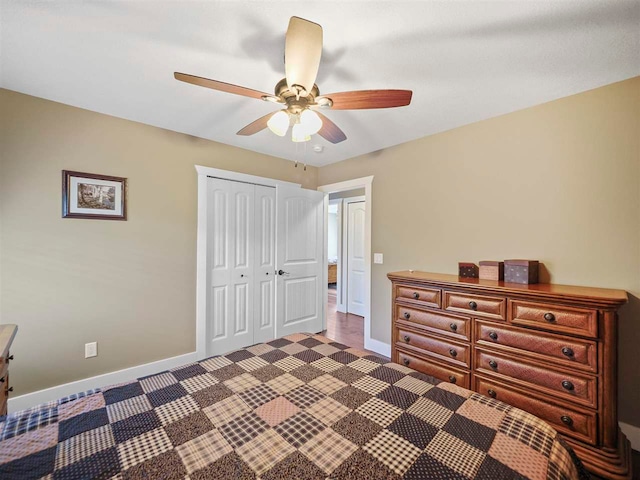 10300 Vista Ridge Dr, Alden, MI 49612 - carpeted bedroom featuring baseboards, a closet, and ceiling fan