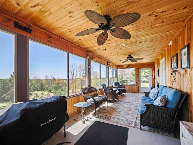 10300 Vista Ridge Dr, Alden, MI 49612 - sunroom with a ceiling fan, healthy amount of natural light, and an outdoor hangout area