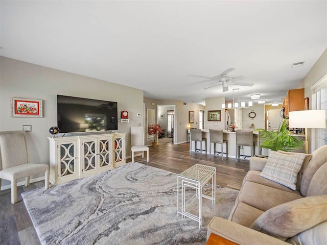 1564 Emerald Ct Unit 85, Petoskey, MI 49770 - living area featuring wood finished floors and a ceiling fan