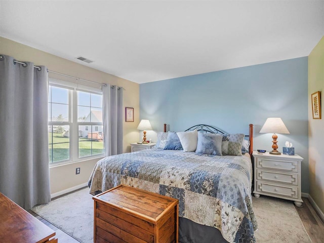 1564 Emerald Ct Unit 85, Petoskey, MI 49770 - bedroom featuring baseboards