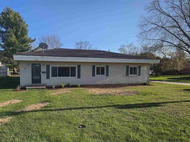 409 Trent St, Boyne City, MI 49712 - ranch-style home with a front yard