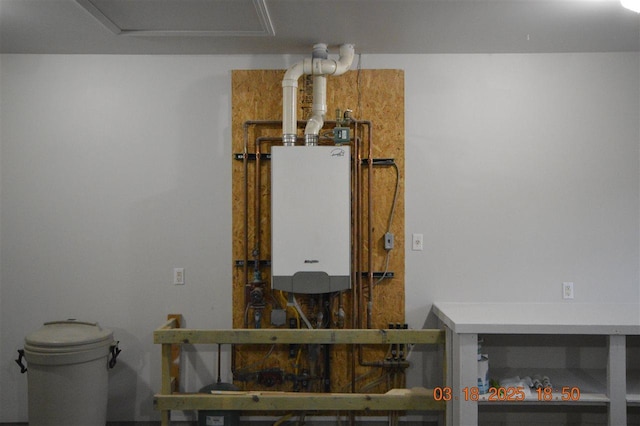 409 Trent St, Boyne City, MI 49712 - utility room featuring water heater