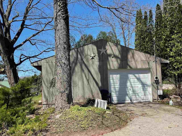 9690 Lake St, Ellsworth, MI 49729 - view of outdoor structure with an outdoor structure and concrete driveway