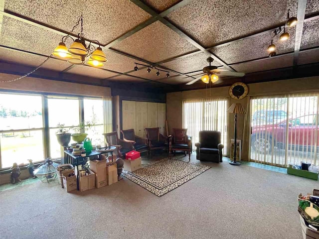 9690 Lake St, Ellsworth, MI 49729 - living area with a ceiling fan and carpet