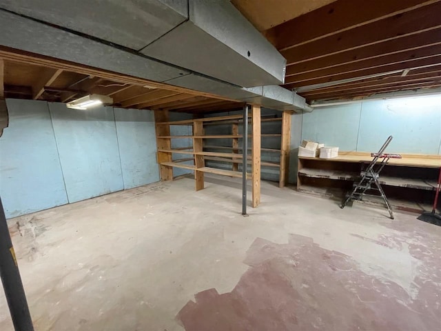 9690 Lake St, Ellsworth, MI 49729 - unfinished basement featuring stairs