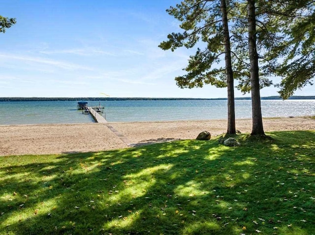 1442 Indian Point Rd, Brutus, MI 49716 - water view featuring a dock