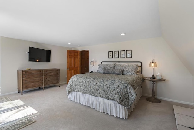 bedroom featuring light carpet, baseboards, and recessed lighting