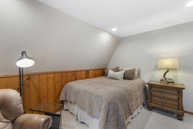 bedroom featuring light colored carpet, vaulted ceiling, and recessed lighting