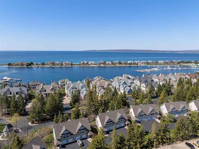 4070 Carriage House Dr Unit 5 & 6, Bay Harbor, MI 49770 - aerial view of residential area with a nearby body of water