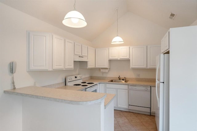4070 Carriage House Dr Unit 5 & 6, Bay Harbor, MI 49770 - kitchen with white appliances, under cabinet range hood, a sink, a peninsula, and lofted ceiling