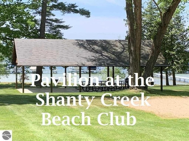 5350 Golfview Rd, Bellaire, MI 49615 - view of property's community featuring a yard