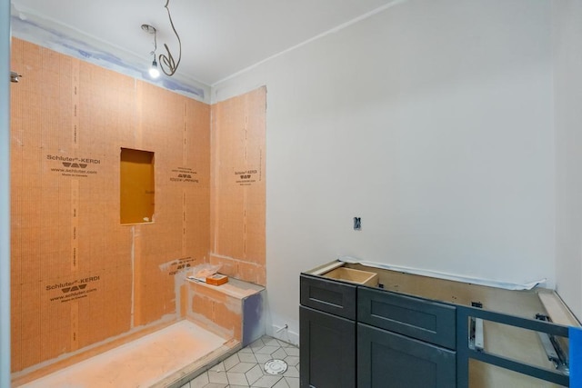 bathroom with tile patterned floors