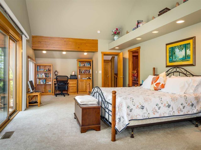 998 N Shr, Walloon Lake, MI 49796 - carpeted bedroom featuring recessed lighting, multiple windows, and a desk