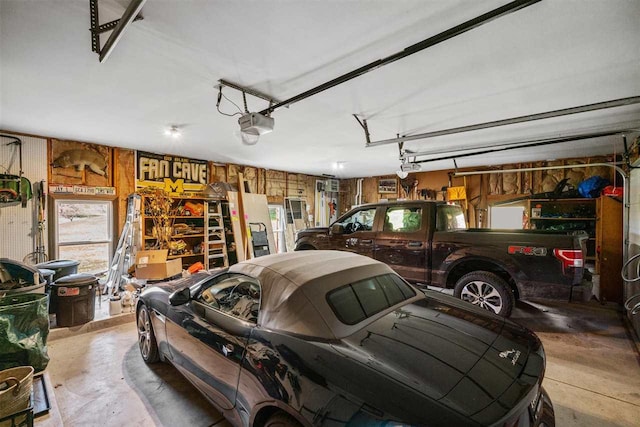 110 Birchwood Dr, Harbor Springs, MI 49740 - garage with a garage door opener