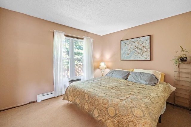 6141 S Old 31, Charlevoix, MI 49720 - carpeted bedroom with a textured ceiling and a baseboard radiator