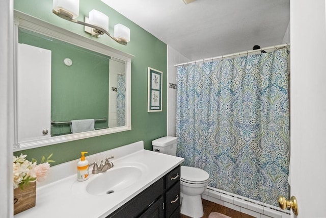 6141 S Old 31, Charlevoix, MI 49720 - full bath featuring baseboard heating, toilet, vanity, and a shower with shower curtain