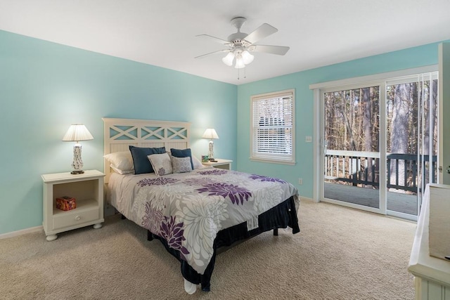 12175 Cottage Ln Unit 2, Charlevoix, MI 49720 - carpeted bedroom with access to exterior, baseboards, and ceiling fan