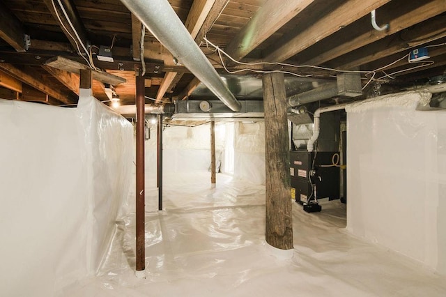 312 Grove St, Petoskey, MI 49770 - unfinished below grade area with heating unit