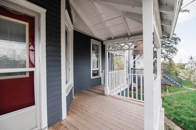 312 Grove St, Petoskey, MI 49770 - deck featuring covered porch