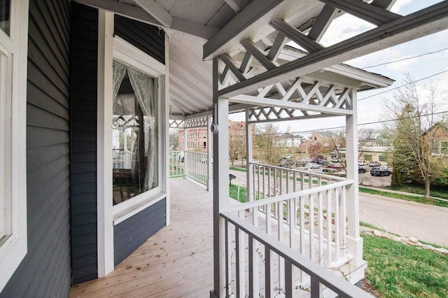 312 Grove St, Petoskey, MI 49770 - deck featuring a porch