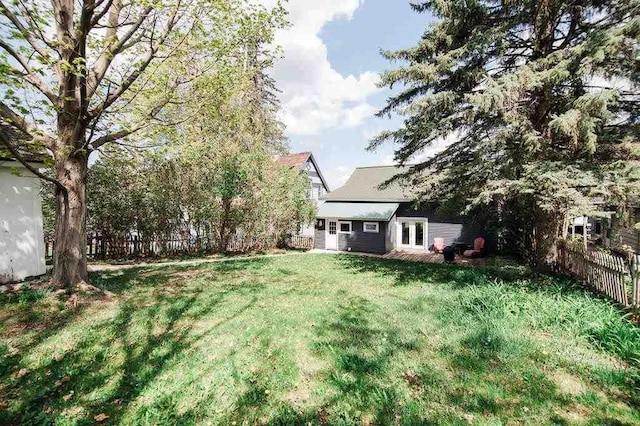 312 Grove St, Petoskey, MI 49770 - view of yard featuring french doors