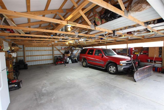 4155 Welsch Rd, Petoskey, MI 49770 - garage with freestanding refrigerator