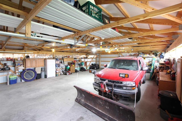 4155 Welsch Rd, Petoskey, MI 49770 - garage featuring a workshop area