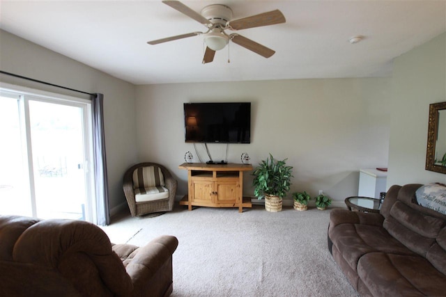 4155 Welsch Rd, Petoskey, MI 49770 - living area featuring carpet floors and a ceiling fan