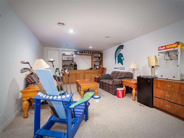 911 Regent Ct, Petoskey, MI 49770 - living room featuring carpet flooring and recessed lighting