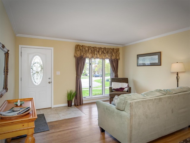 911 Regent Ct, Petoskey, MI 49770 - living area featuring crown molding, light wood-style flooring, and baseboards