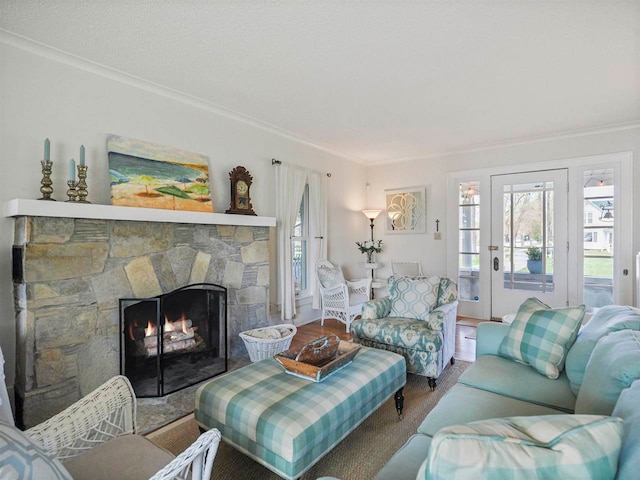 402 E Dixon Ave, Charlevoix, MI 49720 - living room with crown molding and a stone fireplace